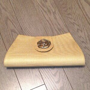 Elegant Gold Clutch with Floral Accent - Excellent Condition